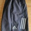 Pantalonetas hombre Adidas Own the Run 7" (Gris)