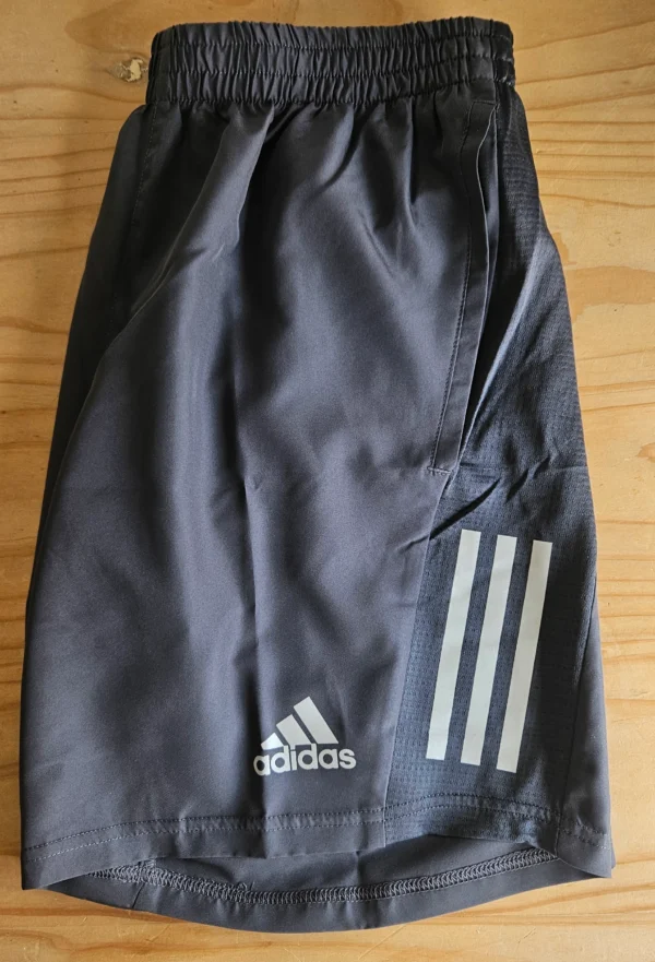 Pantalonetas hombre Adidas Own the Run 7" (Gris)